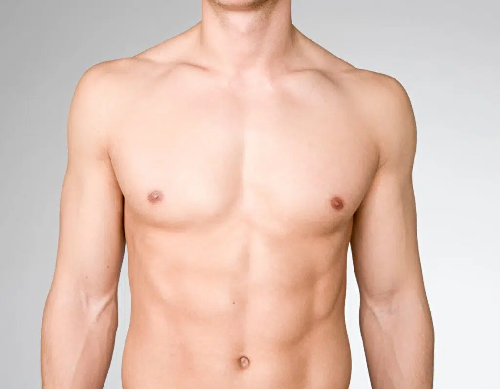 Photo du torse nu et abdomen muscle d un jeune homme Gynecomastie | Dr Barbera Paris