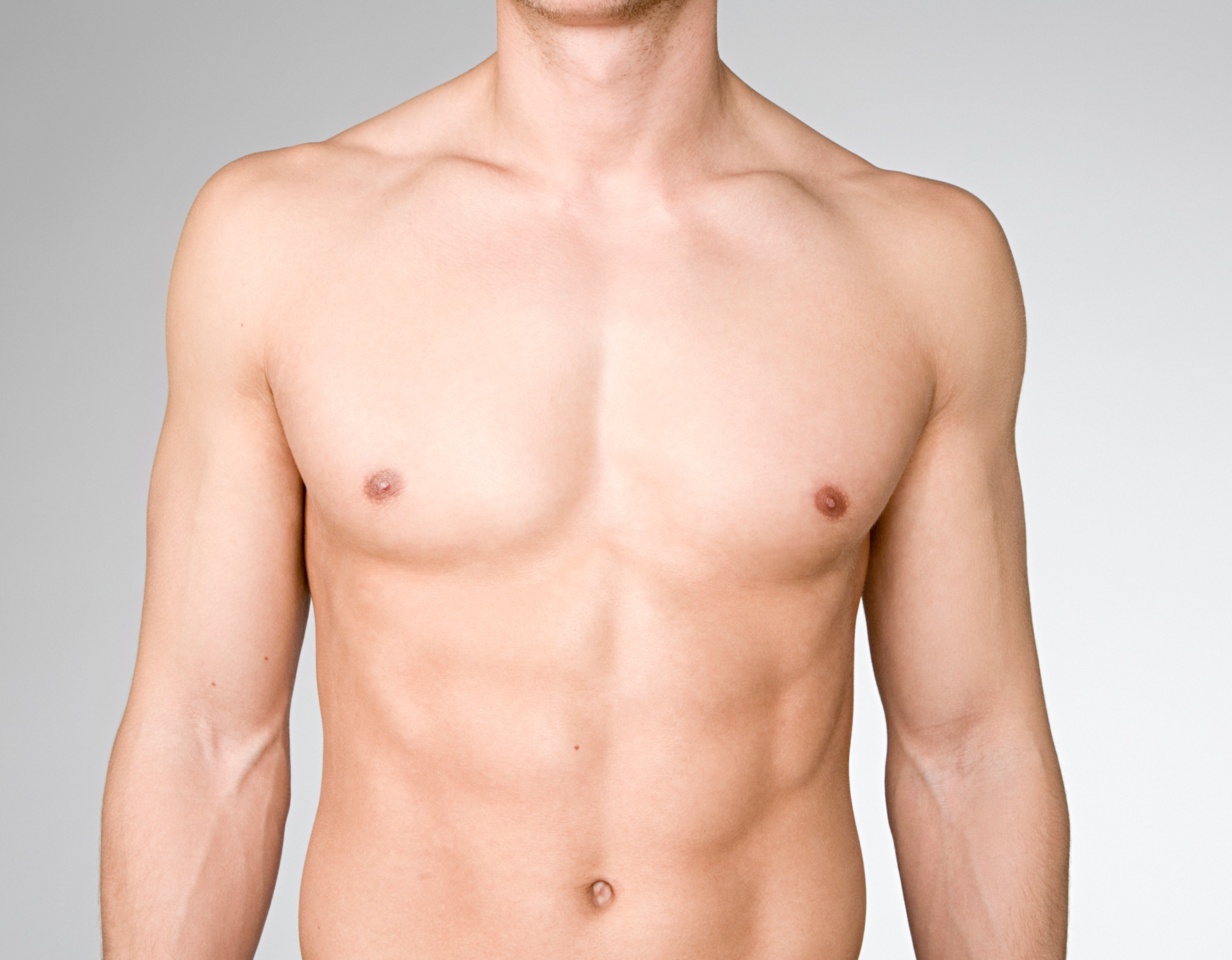 Photo du torse nu et abdomen muscle d un jeune homme Gynecomastie | Dr Barbera Paris